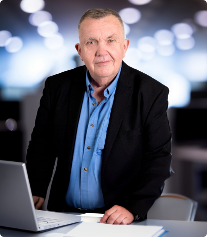 Photograph of Rob Buchel, the Founder and Client Experience Officer of B2B Websites, standing confidently and professionally.